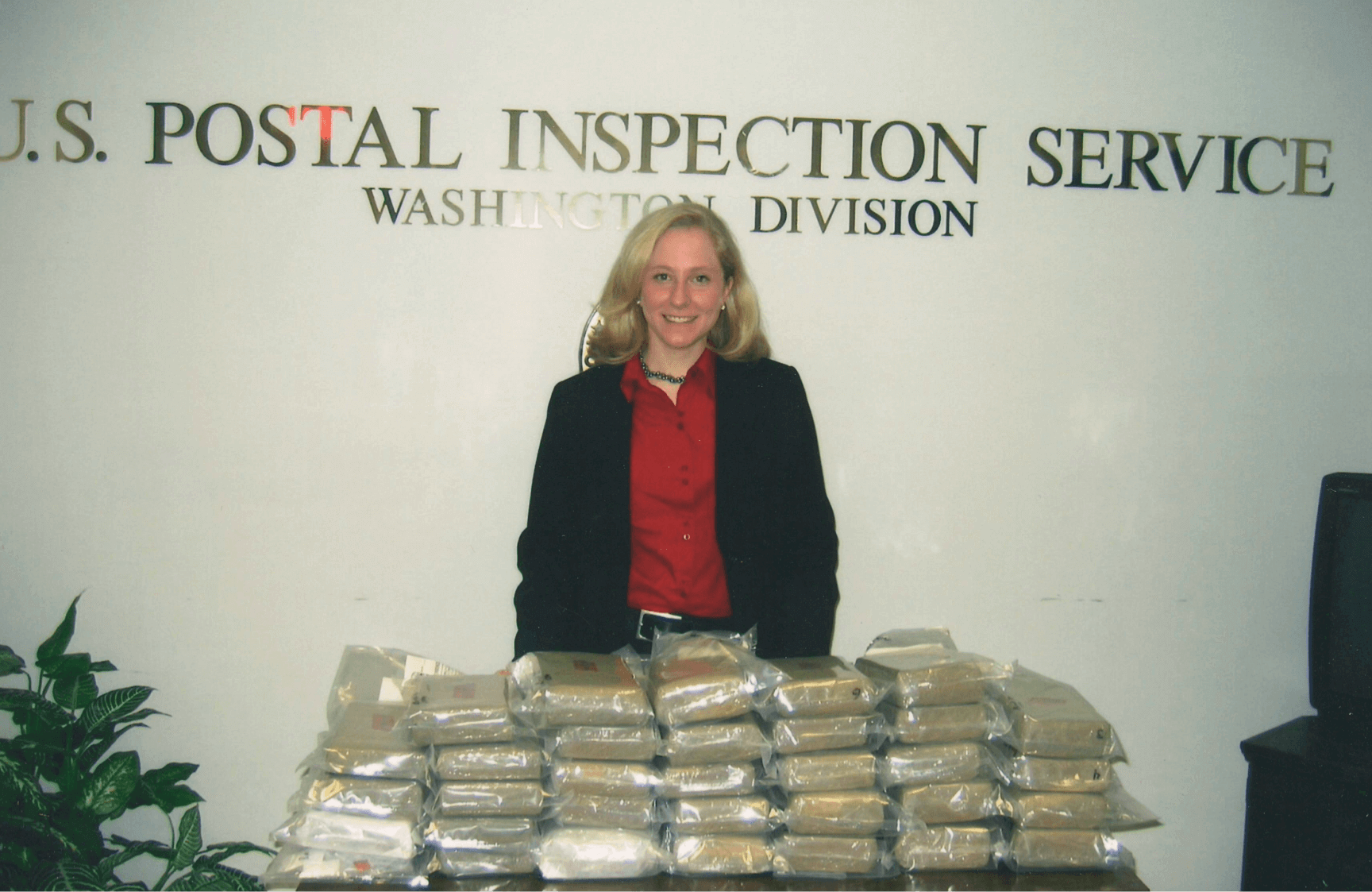 Abigail Spanberger's public service career began as a federal law enforcement officer, cracking down on narcotics traffickers and working money laundering cases.